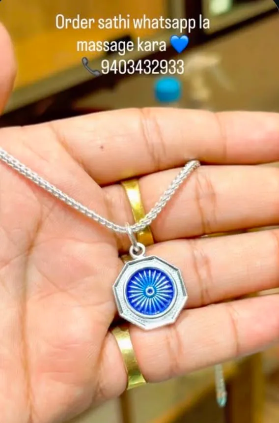 aashok charkr with pendent